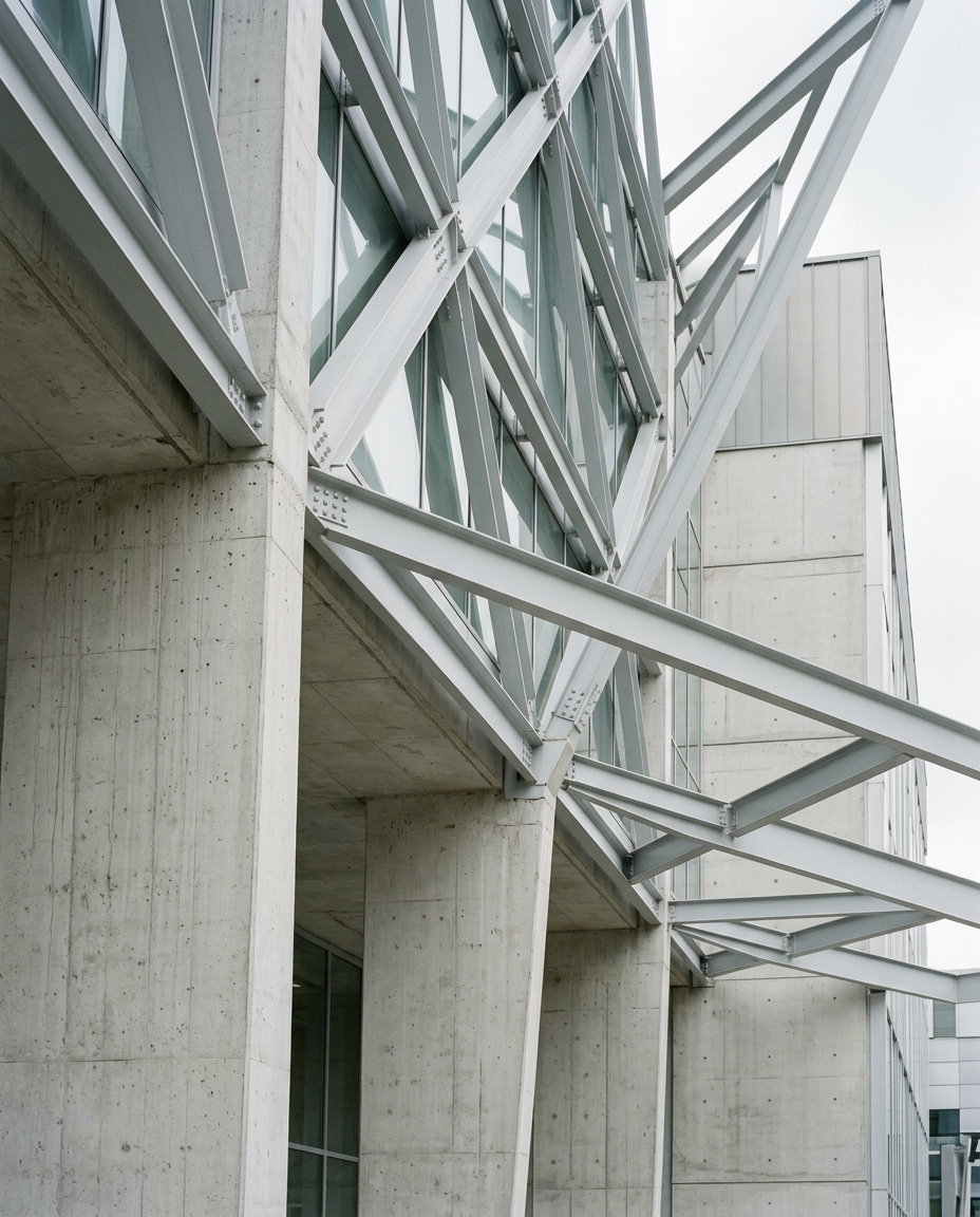 Precise steel and concrete structural beams in soft daylight